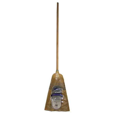 Traditional broom with a wooden handle and straw bristles on a white background