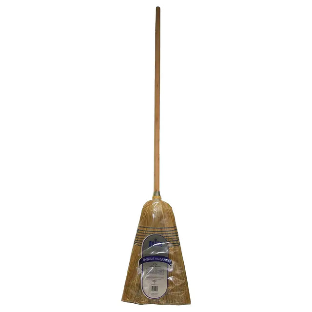 Traditional broom with a wooden handle and straw bristles on a white background