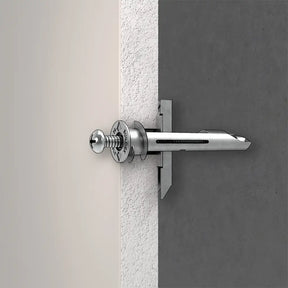 Metal door handle on a door frame with a neutral background