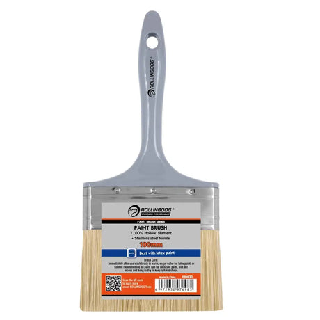 Paint brush with wooden handle and metal ferrule on a white background