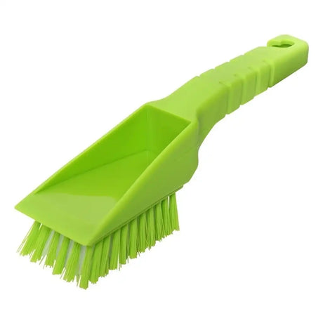 Green brush with a dustpan on a white background