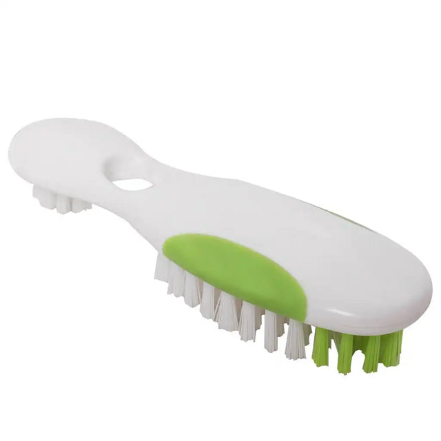 White and green brush with bristles on a white background