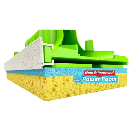 Cleaning tool with green frame, yellow sponge, and white foam on a white background