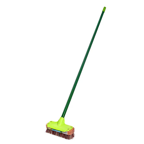 Green broom with a long handle on a white background