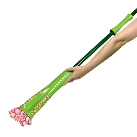 Green mop with red and white patterned head held by a hand on a white background