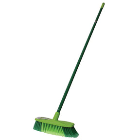 Green broom with a long handle on a white background