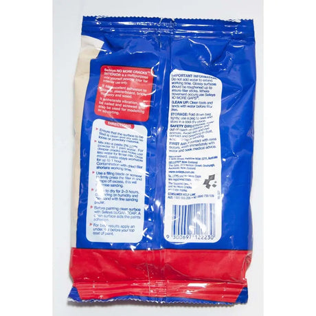 Back view of a blue and red package with text and a barcode on a white background