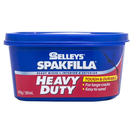 Selleys Spakfilla Heavy Duty filler container with blue lid and red label on a white background