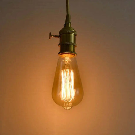 Vintage-style light bulb on a warm background