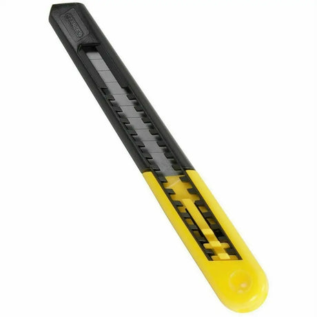Black and yellow utility knife on a white background