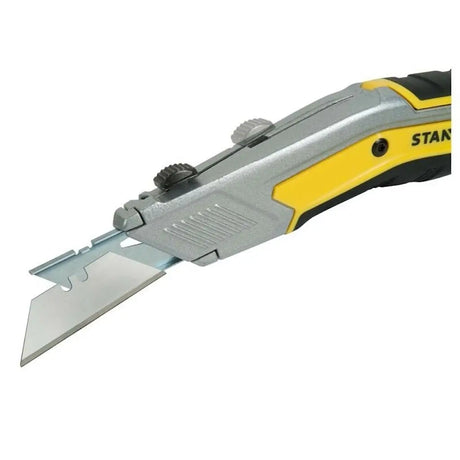 Stanley knife with open blade on a white background