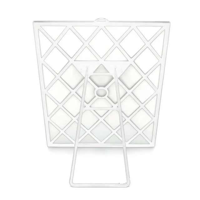 White metal basket with geometric design on a white background