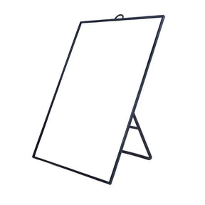 Black metal stand with a white board on a white background