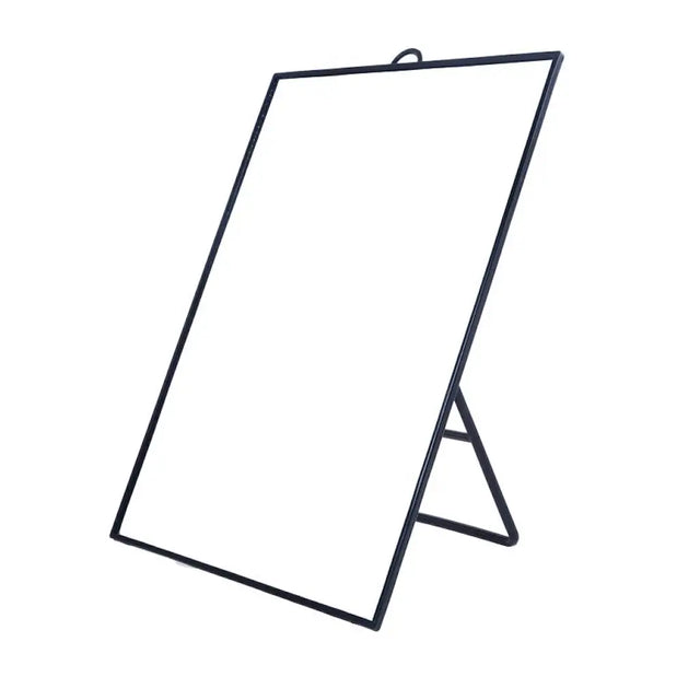 Black metal stand with a white board on a white background
