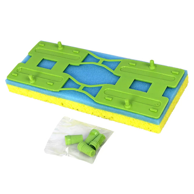 Green and blue foam board with yellow border and small green objects in a clear bag on a white background