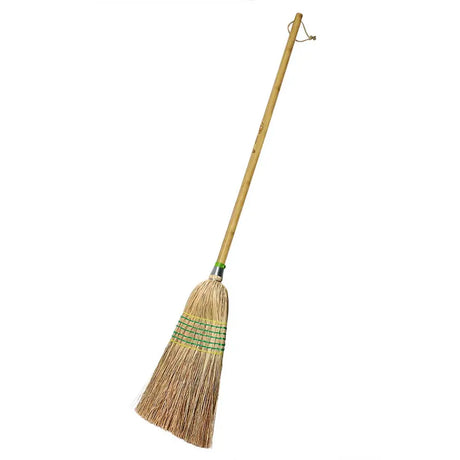 Broom with a long handle on a white background