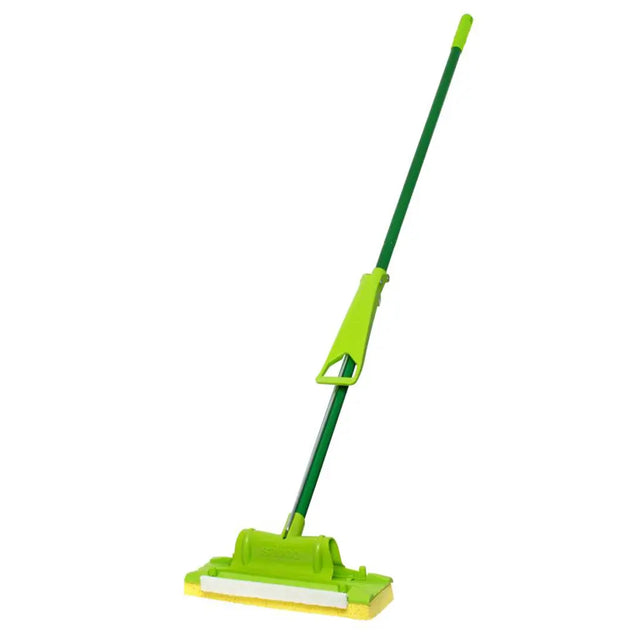 Green and yellow floor cleaning tool on a white background