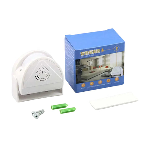 White door bell device with packaging, batteries, and screws on a gray background