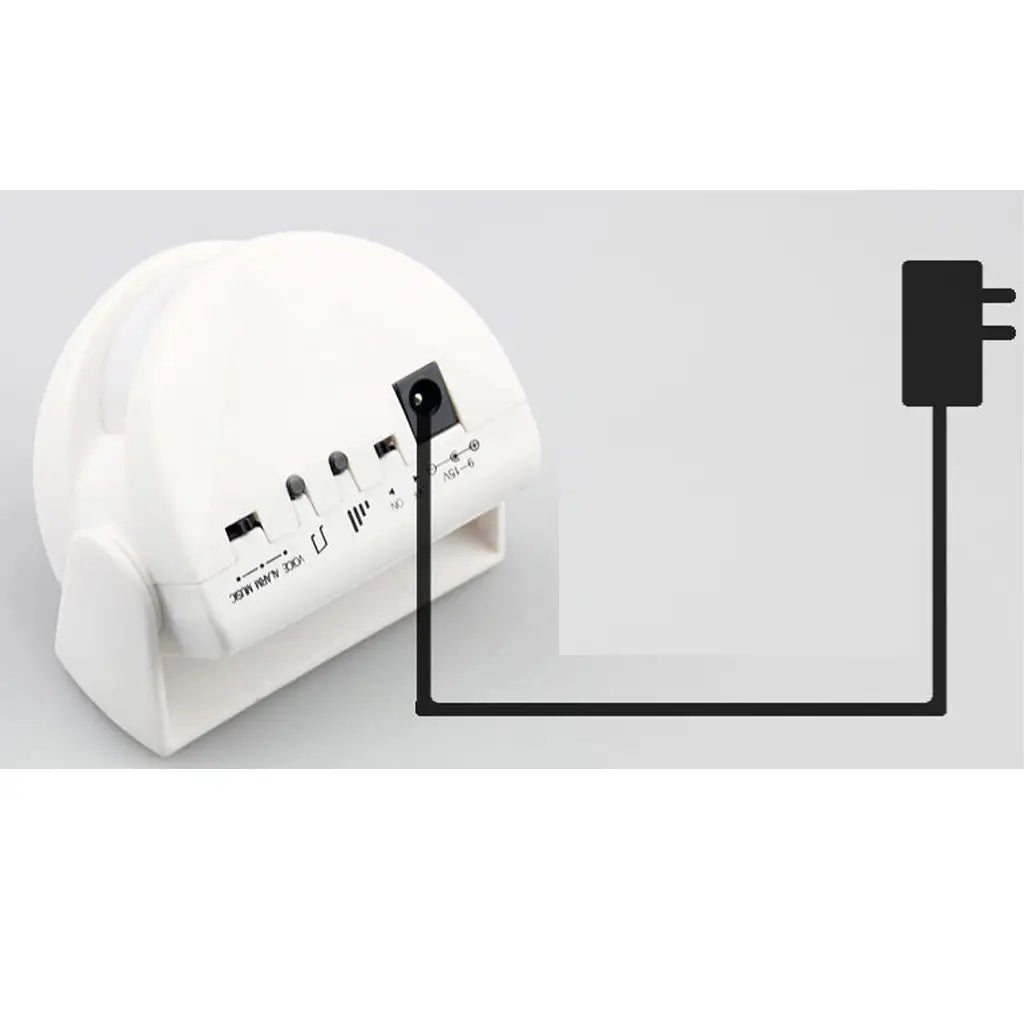 White electronic device with multiple ports on a light gray background