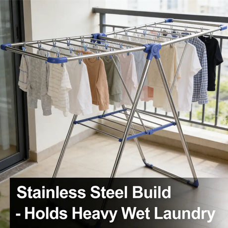 Stainless steel drying rack with clothes on a balcony