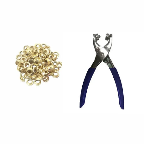 Gold eyelets and a pair of blue-handled pliers on a white background