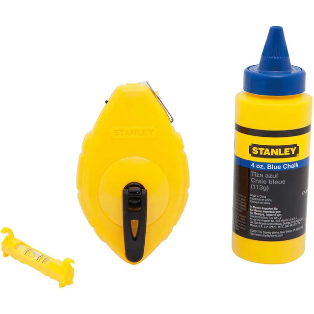 Stanley blue chalk bottle and tape measure on a white background