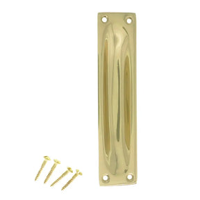 Polished brass door handle with screws on a white background