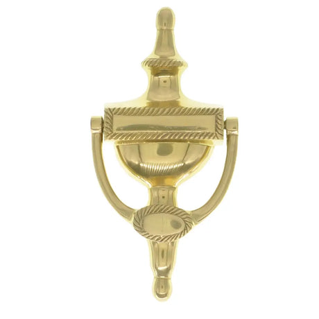 Gold door knocker on a white background