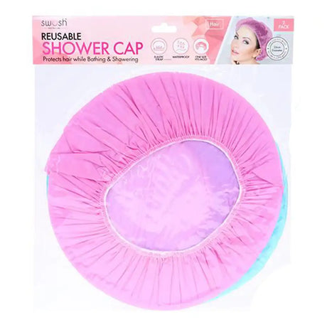 A reusable shower cap in bright pink, shown inside its retail packaging with a header card. The packaging text reads 'swushi REUSABLE SHOWER CAP' and includes a small photo of a woman wearing the cap.