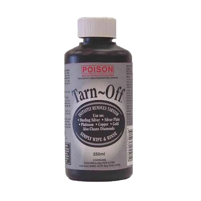 Bottle of Tarn-Off cleaning solution with a white cap on a white background