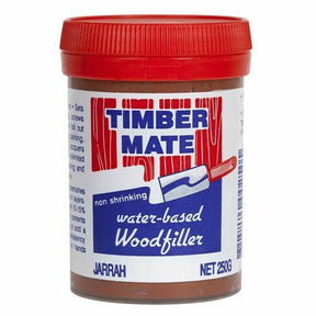 Jar of Timber Mate water-based woodfiller with red lid on a white background