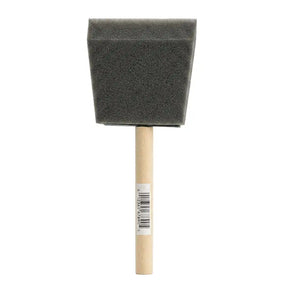 Foam brush with wooden handle on a white background