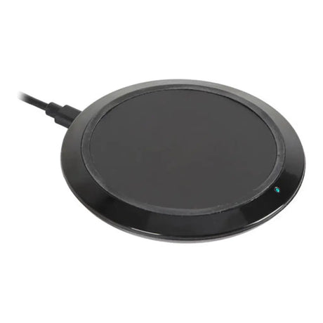 Black round heating pad with a power cable on a white background
