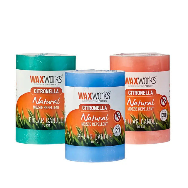 Three Waxworks Citronella mozzie repellent pillar candles on a white background