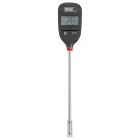 Digital thermometer with a metallic probe on a white background