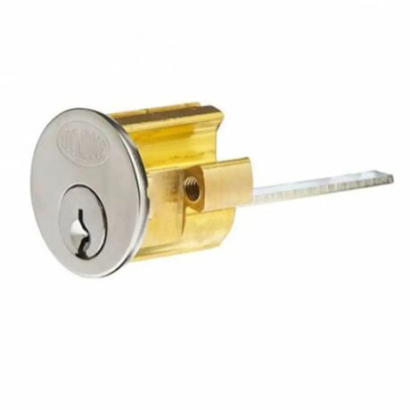 Gold and silver door lock mechanism on a white background