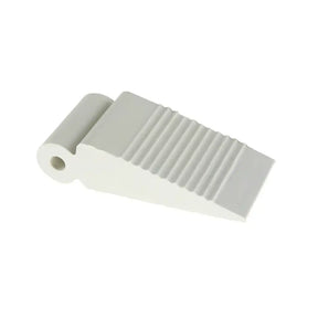 Gray plastic strip with textured surface on a white background