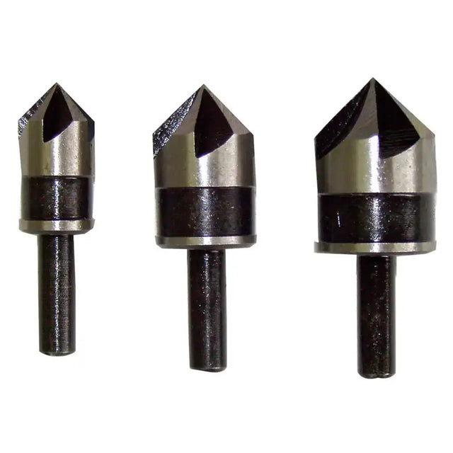 Three metal rotary burr bits of different sizes arranged horizontally on a plain white background.