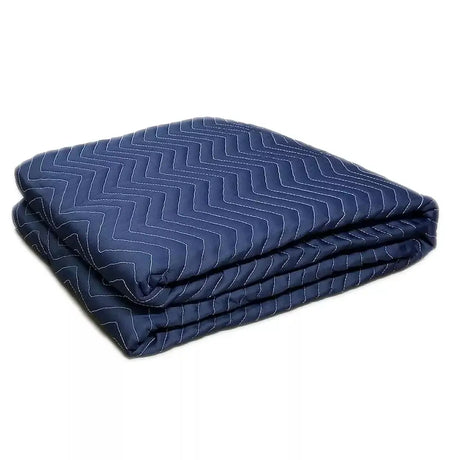 Folded blue blanket with zigzag pattern on a white background