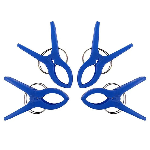 Four blue plastic clips on a white background