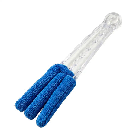 Cleaning brush with blue bristles on a clear handle against a white background