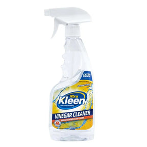 Clear vinegar cleaner bottle with a white spray nozzle on a white background