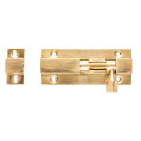 Gold metal latch on a white background