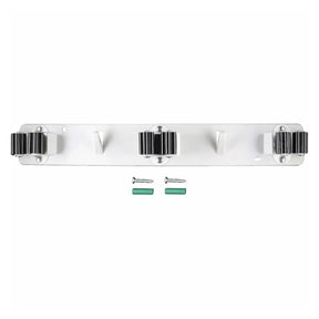 White wall-mounted coat rack with three hooks and two screws on a white background