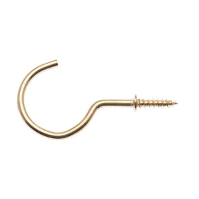 Brass-colored metal hook with screw on a white background