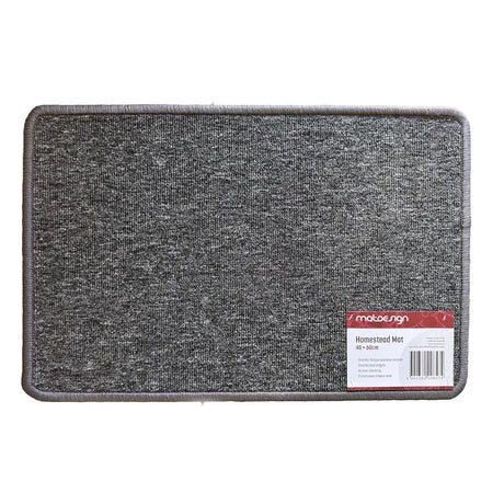 Gray doormat with a brand label on a white background