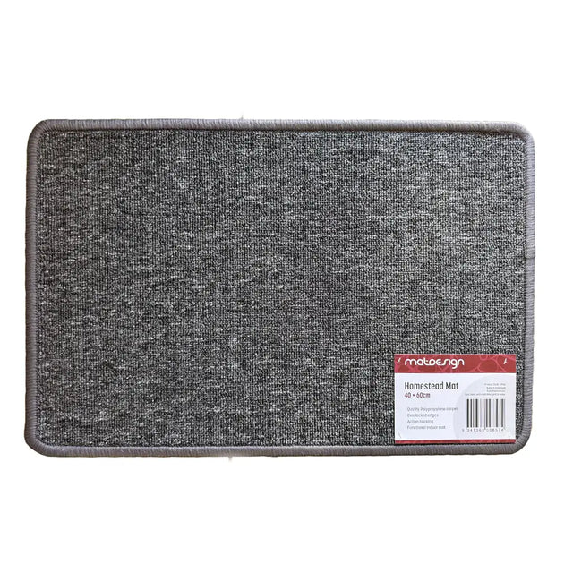 Gray doormat with a brand label on a white background
