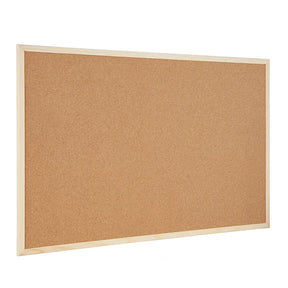 Cork bulletin board with wooden frame on a white background